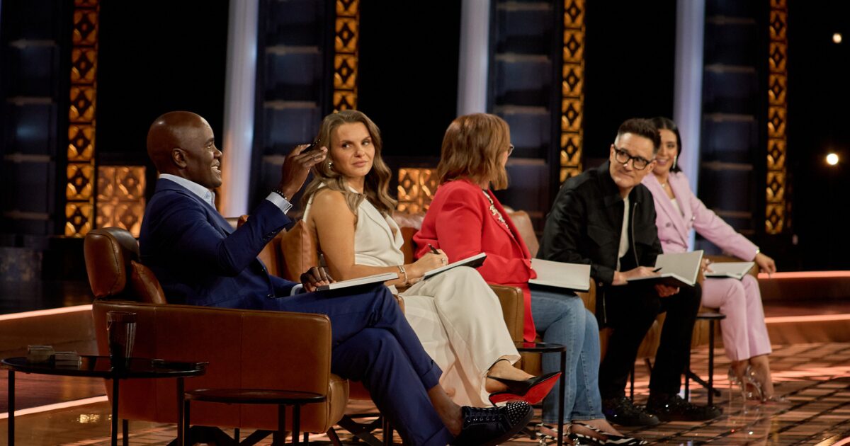 Dragons' Den investors sitting in chairs during filming. From left to right: Wes Hall, Michele Romanow, Arlene Dickinson, Brian Scudamore, Manjit Minhas.