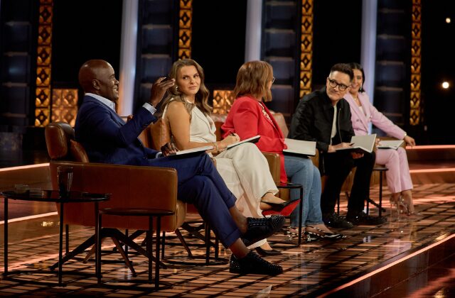 Dragons' Den investors sitting in chairs while filming a Dragons' Den episode. From left to right: Wes Hall, Michele Romanow, Arlene Dickinson, and Brian Scudamore.